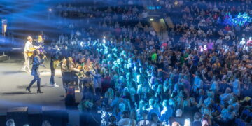 Ant mokyklos sienos – sostinės panorama: tapytojas užbaigė amžinybėn iškeliavusios draugės projektą