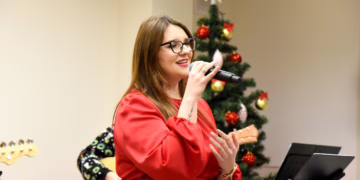 Poškonių kaime plačiai nuskambėjo kalėdinių giesmių magija